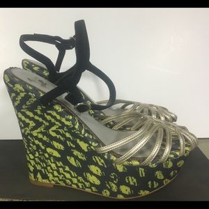 Unique gorgeous wedge sandals.